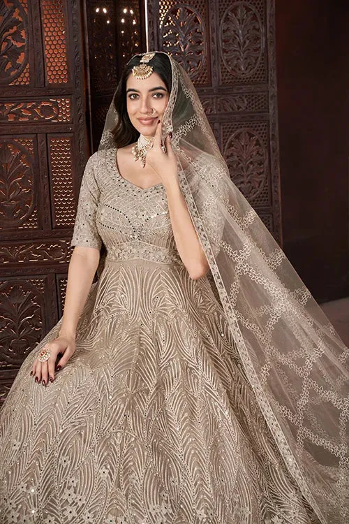 Chiku Color Embroidered Net Fabric Long Gown – Perfect for Festive Occasions